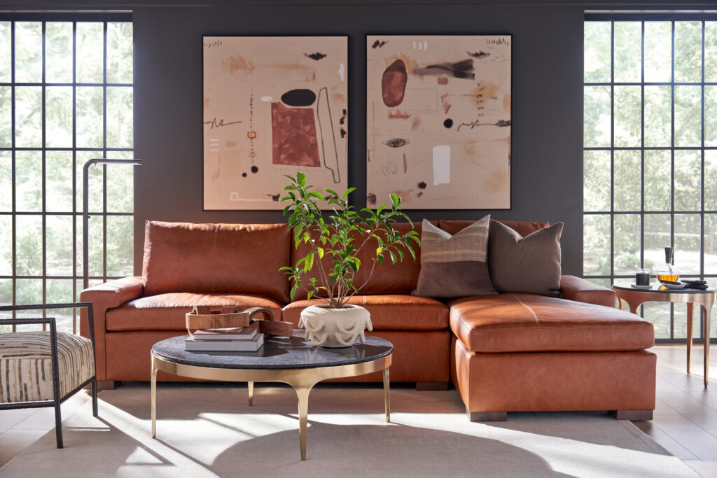 Cognac leather Modern U Choose sectional with a chaise, track arms, and loose back cushions