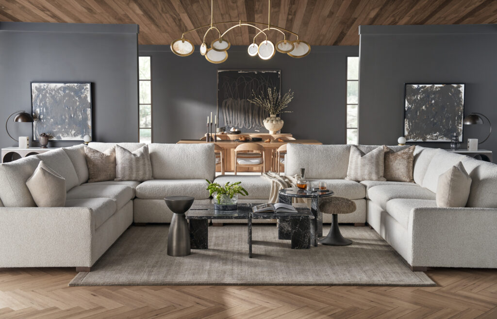 Large light-colored Modern U Choose sectional in a textured fabric, arranged in a U in a room with a wood ceiling.